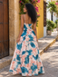 Vestido largo estampado de hojas y falda acampanada