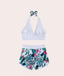 Vestido de baño tropical de dos piezas con short vista trasera blanco