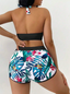 Vestido de baño tropical de dos piezas con short vista trasera negro turquesa
