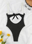 Vestido de baño negro y blanco con escote en V vista posterior