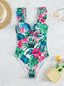 Detalle del ribete delantero del vestido de baño estampado tropical