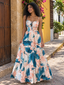 Vestido largo estampado de hojas y falda acampanada